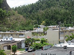 Houses at the foot of two mountains in Monte Llano