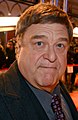 John Goodman interprète Dr Eli Gemstone.