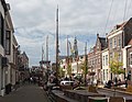 Maassluis, street view (de Veerstraat) with tugboat during the Furieade