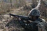 Pakistani soldier taking combat position