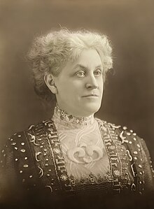 Carrie Chapman Catt, by the Joint Suffrage Procession Committee (restored by Adam Cuerden)