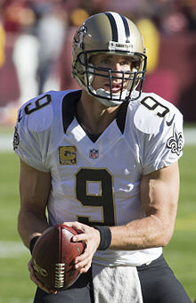Drew Brees holding a football