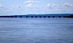 A long box girder bridge seen from several kilometers (miles) away.