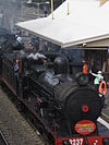 A triple-headed steam locomotive powered train operated by 3801 Limited at the Hunter Valley Steamfest in 2009