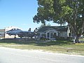 Grumman F-14 Tomcat fighter-interceptor next to museum