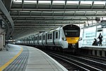 A Class 700 train in Thameslink service approaches London Blackfriars in August 2017