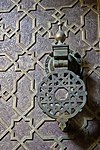 Geometric motifs on the bronze plating of the doors of the Al-Attarine Madrasa (14th century)