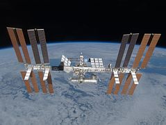 The space station, showing the completed truss assembly (as of March 2009)