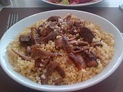 Kaz tiridi, a Turkish specialty of goose meat served over bulgur