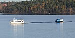 M/S Lux och E/S Nova på Ekeröpendeln utanför Brommalandet på väg mot Tappström från Klara Mälarstrand.