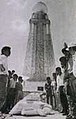 Salvadorans observe the collapsed statue of the monument after it toppled during the great 1986 San Salvador earthquake.