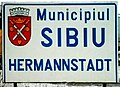 Romanian-German bilingual sign at the entrance in Sibiu (‹See Tfd›German: Hermannstadt)