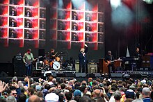 The Charlatans performing onstage at Scarborough Open Air Theatre, 29th June 2024