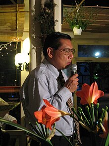 Tran Bich San speaking in Paris, France.