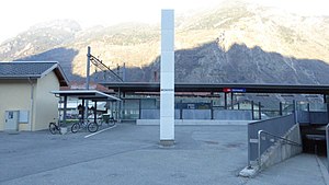 Canopy-covered platform with mountains in the distance