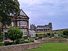 View of Whitby YHA hostel and its garden with Whitby Abbey in the background