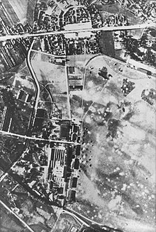 Aerial photograph of a town and field