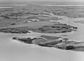 Aerial view of Wiroa Island in 1954 before the construction of Auckland Airport