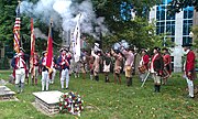 Photo taken on May 20, 2011 of Mecklenburg Declaration reenactors firing a gun salute after laying a wreath at the grave of General Thomas Polk at Settler's Cemetery, Charlotte, North Carolina.