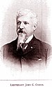 Head and shoulders of an older white man with Van Dyke mustache and goatee wearing a dark suit over a white shirt and dark tie. Below are the words "LIEUTENANT JOHN C. CURTIS".