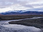 Polar landscape with a river and mountains