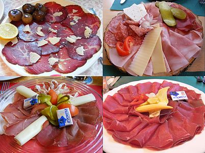 Różne dania z suszonego mięsa z kantonu Gryzonia, Szwajcaria - suszona wołowina, coppa, prosciutto i gotowana szynka