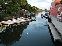 Bancas by the bridge serving the residents of the barrios