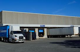 Typical warehouse exterior showing loading docks