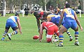 Nauru and Canada contest the ball at ground level at the 2008 Australian Football International Cup.