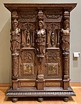 Cupboard; c. 1580; walnut and oak, partially gilded and painted; height: 2.06 m, width: 1.50 m; Louvre[155]