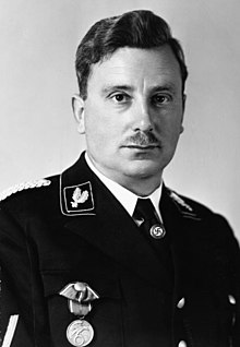 A black-and-white portrait of Maurice in a uniform