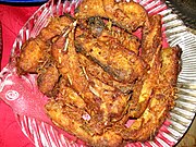 Fried rui served in Dhaka, Bangladesh