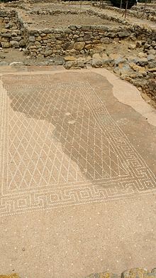 A mosaic in the Neapolis. The Greek word "Ηδύκοιτος" ("the pleasure of lying down") is at the top.