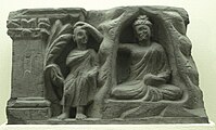 Ānanda (left) and the Buddha