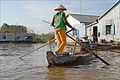 Canoeing in Con Tien floating village