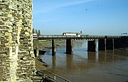 Trains pass near to the castle on the railway bridge crossing the River Usk