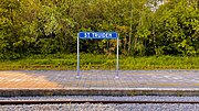 Place name sign on a platform