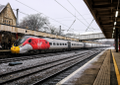 Composition OK - the back of the train is in. But the weather conditions are *awful* and the shallow depth of field means that the back of the train is out of focus. Try again in sunshine. Also, why is this a png?