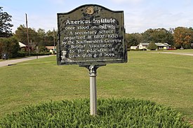 A color photograph of a historical marker for Americus Institute