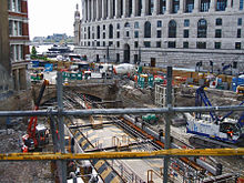 Construction occurring at the Blackfriars Underground station work site during the Thameslink Programme rebuilding, as seen from platform 5 of the Blackfriars mainline station.