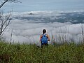 A tourist above clouds