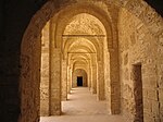 One of the ground-floor galleries around the courtyard