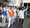 Health workers protest near Salmaniya Medical Complex following reports that paramedic crews and doctors were attacked in the 17 February raid at Pearl Roundabout.