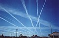 Image 46Water vapor contrails left by high-altitude jet airliners. These may contribute to cirrus cloud formation. (from Aviation)