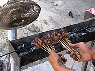 Sate kambing prepared using goat meat