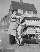 Women deliver the milk in wartime Leeds, 1942