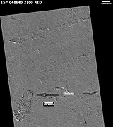 Lava flows affected by obstacles, as seen by HiRISE under HiWish program Arrows show two obstacles that are changing the flow.