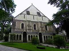 Photographie d'une façade d'un édifice médiéval, à pignon.