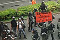 At around 5:40 PM, riot police raised an orange flag