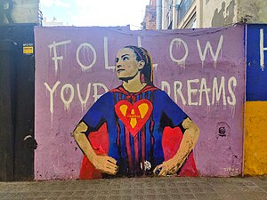 A mural showing Alexia Putellas dressed as Superwoman
